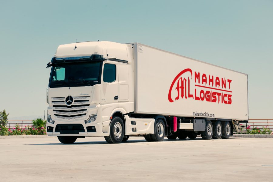 White Mahant Logistics truck and trailer